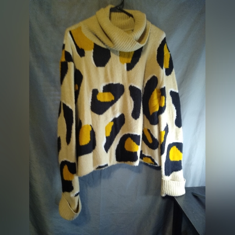 Anthropologie moth stylish Cream and Black animal print Sweater